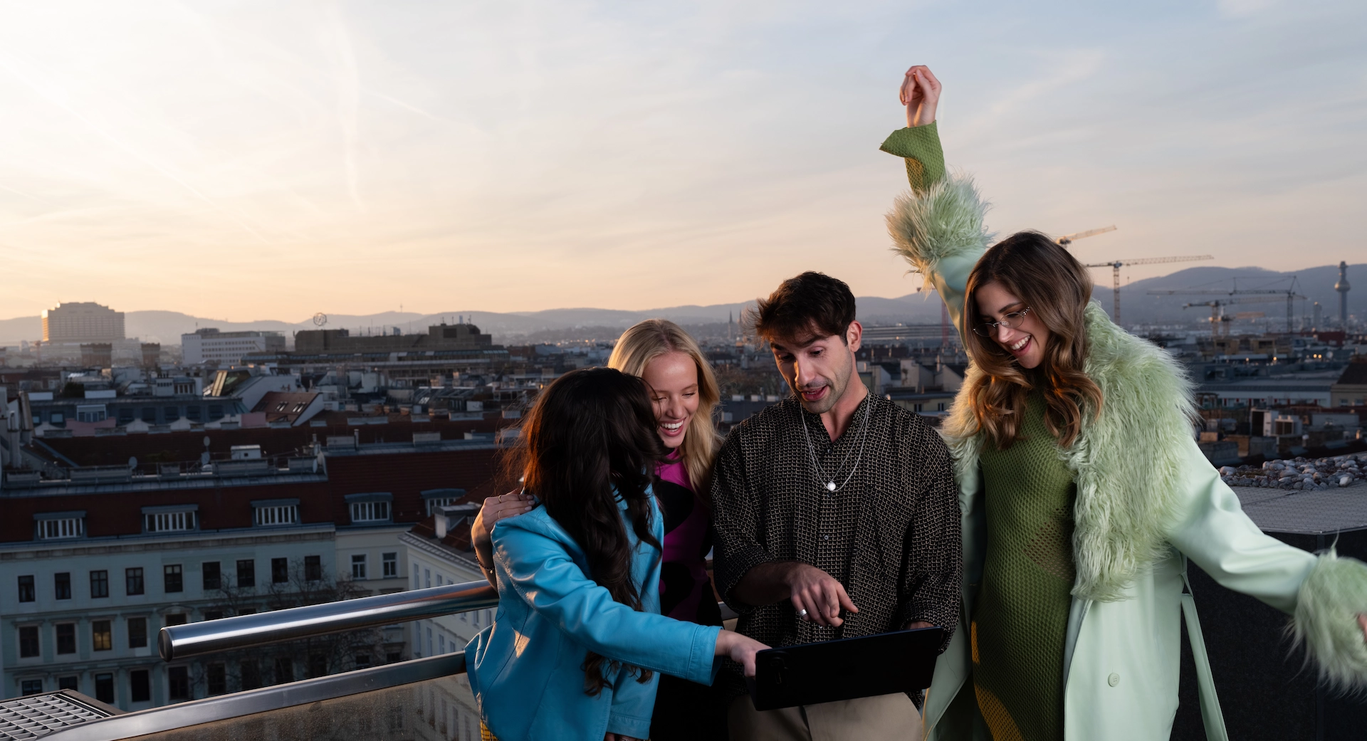 Lystio team members together on a rooftop in Vienna
